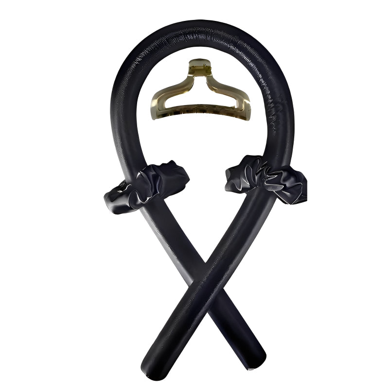 Black headband with hair accessories on a white background
