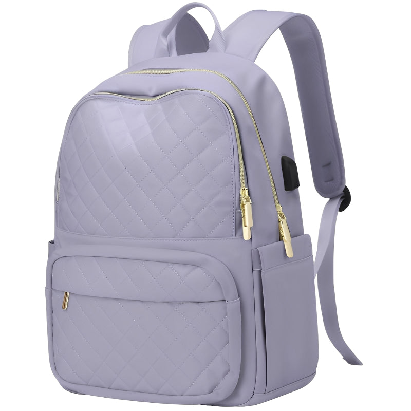 Light purple backpack with quilted pattern on a white background