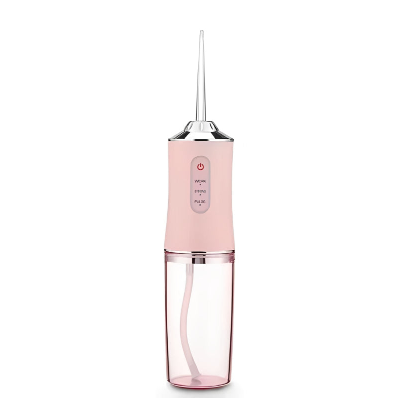 Pink dental water flosser on a white background