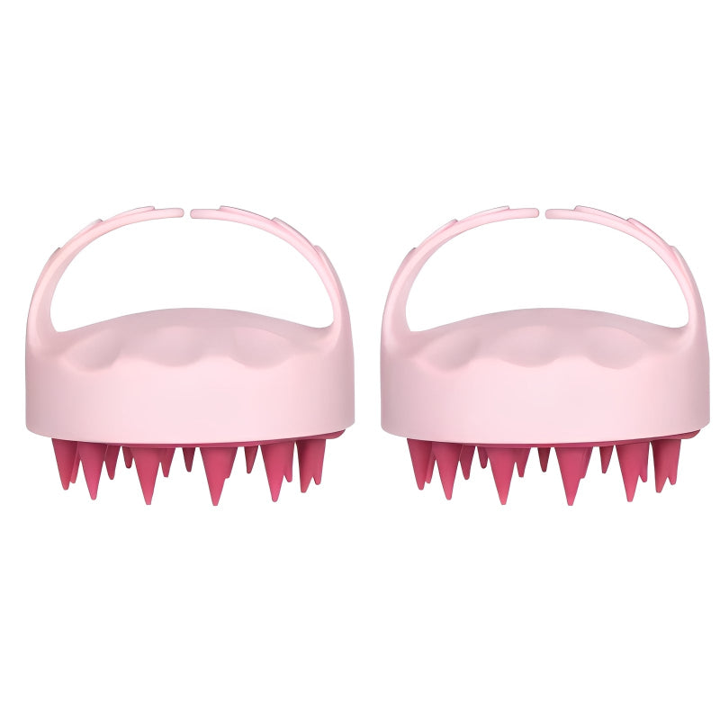 Two pink scalp massagers with textured design on a white background