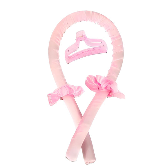 Pink headband with hair attachments on a white background