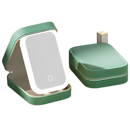 Green jewelry box with a mirror on a white background