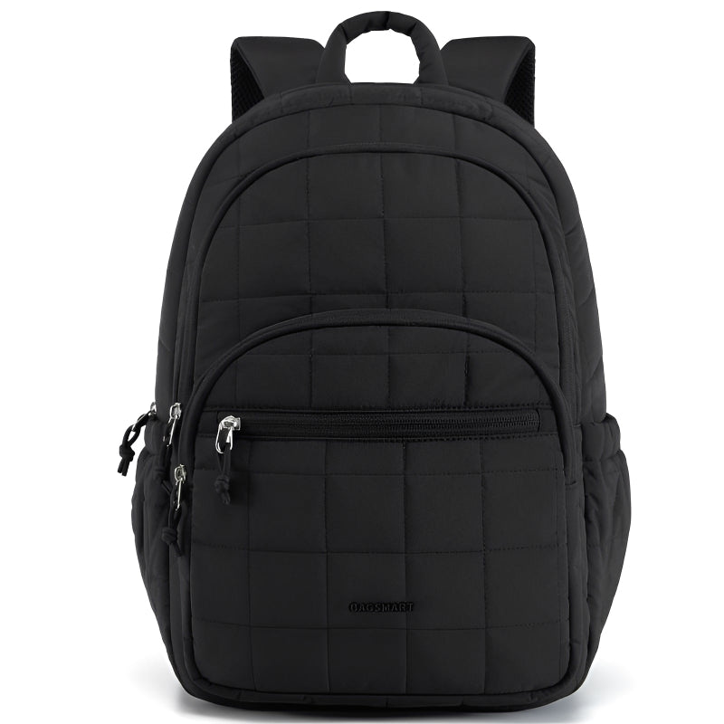 Black quilted backpack on a white background