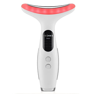 face and neck massager with a red light on a white background