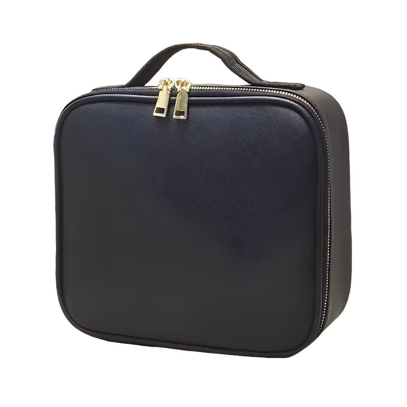 Black makeup case with gold zipper on a white background