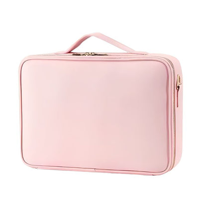 Pink travel case with a handle on a white background