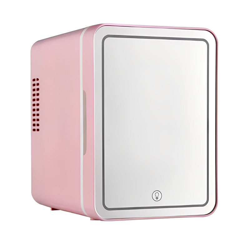 Pink and white mini refrigerator on a white background