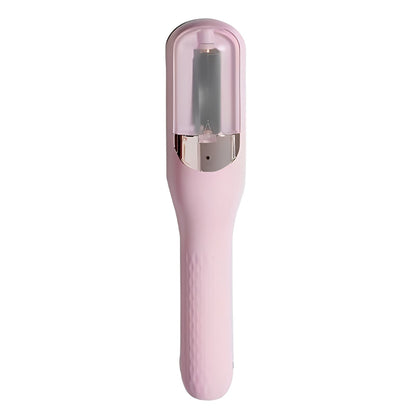 Pink hair device with a metallic component on a white background