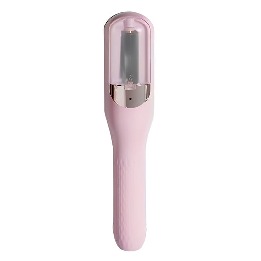 Pink hair device with a metallic component on a white background