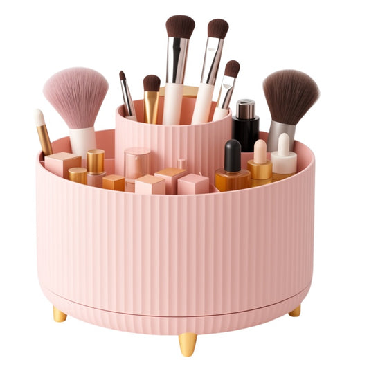 Pink makeup organizer with brushes and products on a white background